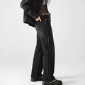 Women in jeans with studded detailing, stylish and versatile for casual wear