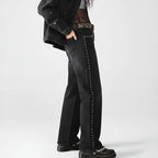 Women in jeans with studded detailing, stylish and versatile for casual wear
