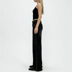 Women in jeans, black with studded details for stylish casual wear