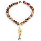 Handcrafted antique copper brass necklace for women with unique stone beads and a carved pendant