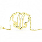 Personalized gold letter necklace featuring an elegant monogram design for a chic accessory