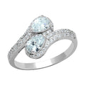 Elegant rhodium plated sterling silver fashion ring with two sparkling gemstones and shimmering accents