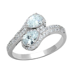 Elegant rhodium plated sterling silver fashion ring with two sparkling gemstones and shimmering accents