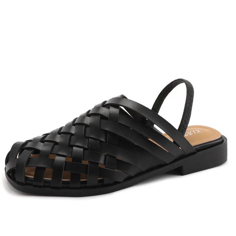 Women-sandals in black woven design, perfect for summer outings