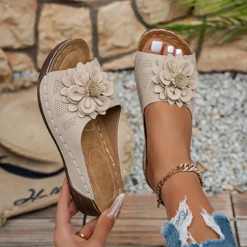 Women slippers UGG in beige with floral embellishments for casual wear