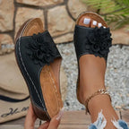 women slippers ugg in black with floral detail for casual wear
