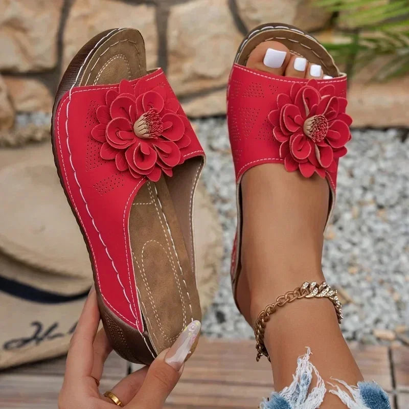 Women slippers UGG in red with flower design, perfect for casual wear