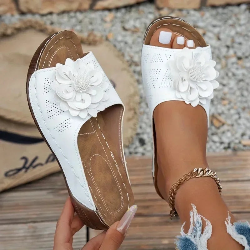 White women slippers UGG with floral design for casual use