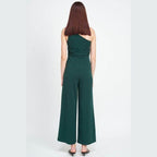 Back view of a green Emory Park summer jumpsuit for women with a stylish one-shoulder design