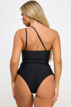 Women's black ribbed bathing suit, perfect for poolside relaxation