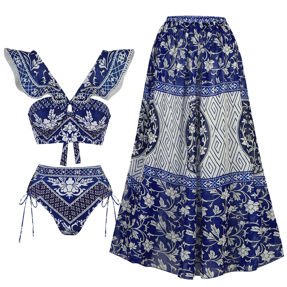 Women's blue floral bikini set with matching skirt, beachwear