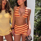 women with swimsuits, striped bikini top and shorts, beachwear