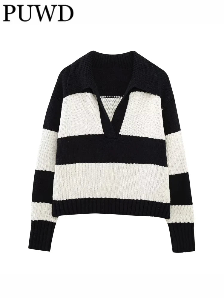 Women's black striped knit sweater featuring a cozy V-neck design and relaxed fit