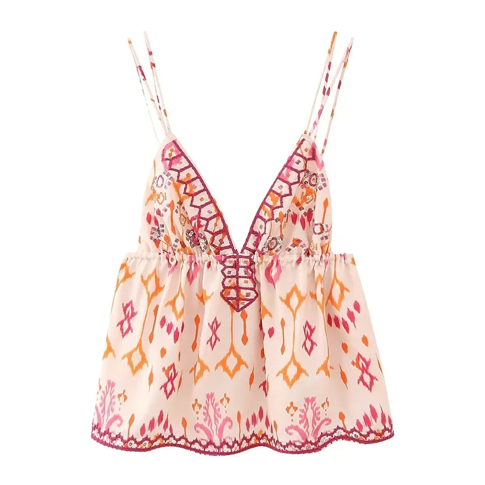 Women's boho top in peach with intricate floral patterns for summer outings