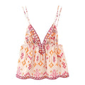 Women's boho top in peach with intricate floral patterns for summer outings
