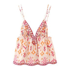 Women's boho top in peach with intricate floral patterns for summer outings