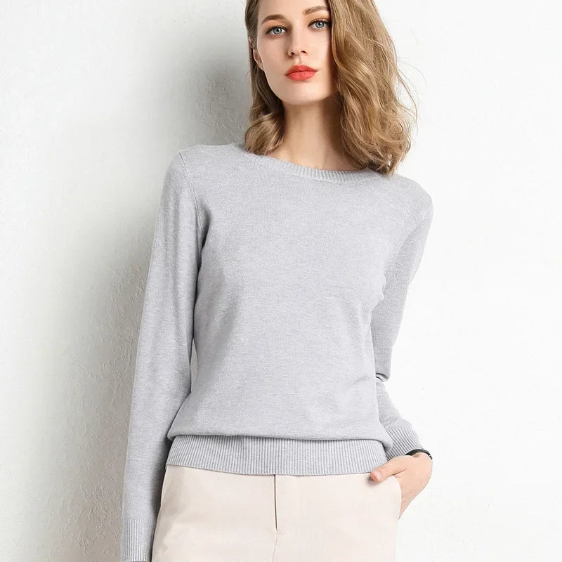 Light gray women's cashmere wool blend sweater with long sleeves and a classic fit