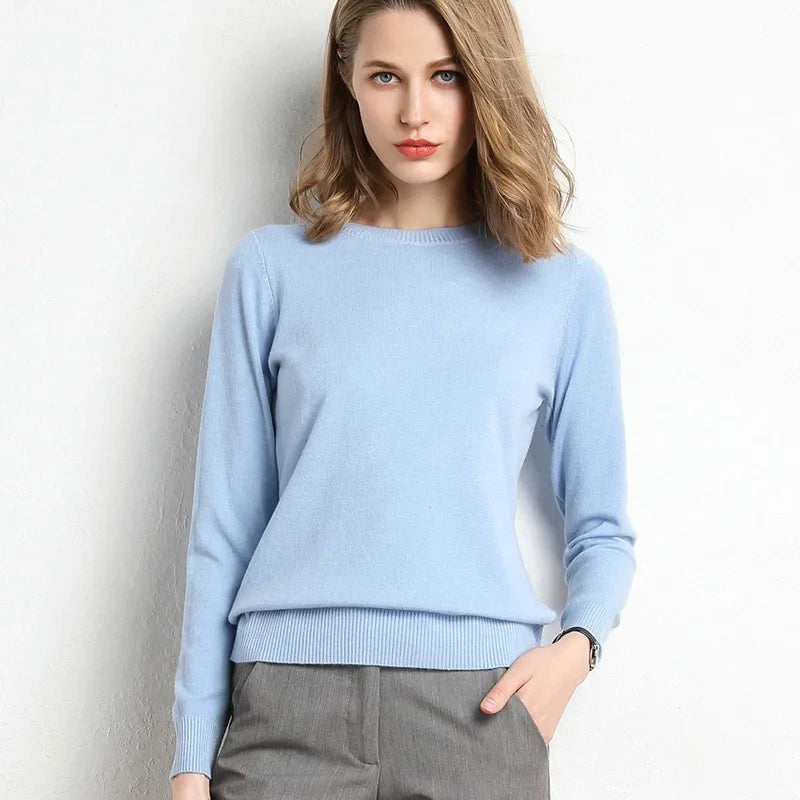 Light blue women's cashmere wool blend sweater with a classic fit and ribbed hem