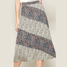 VacationGrabs womens casual vacation skirts featuring mixed floral patterns in a midi length design