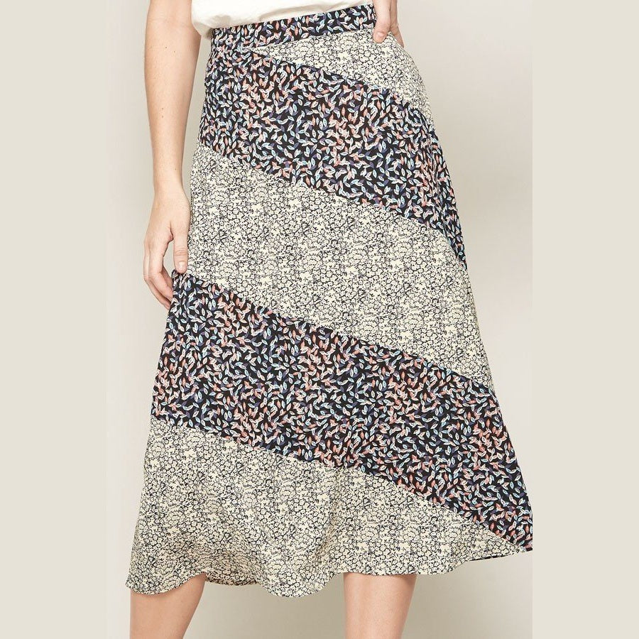 VacationGrabs womens casual vacation skirts featuring mixed floral patterns in a midi length design