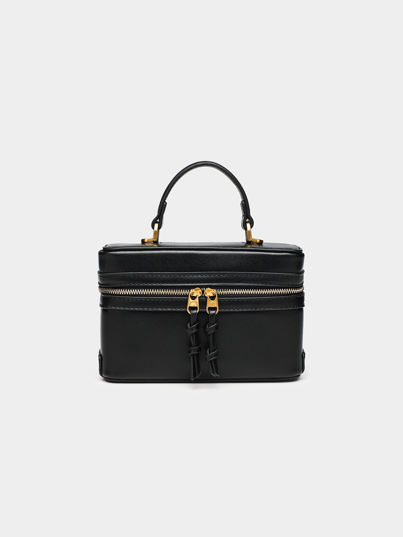 Black women's chic spring shoulder bag with elegant zippers and a stylish handle