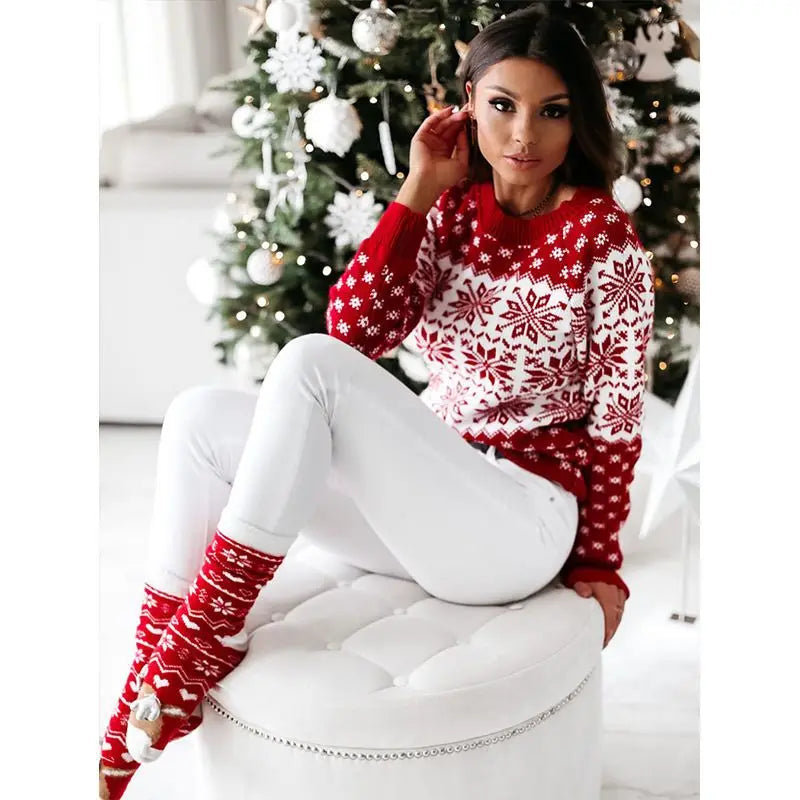 Stylish women's Christmas snowflake sweater in red and white, perfect for festive celebrations