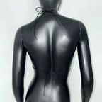 Back view of a sleek black bikini top, perfect for beach days