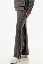 Women's comfy travel tracksuit gray pants with flare leg and side seam detail from VacationGrabs