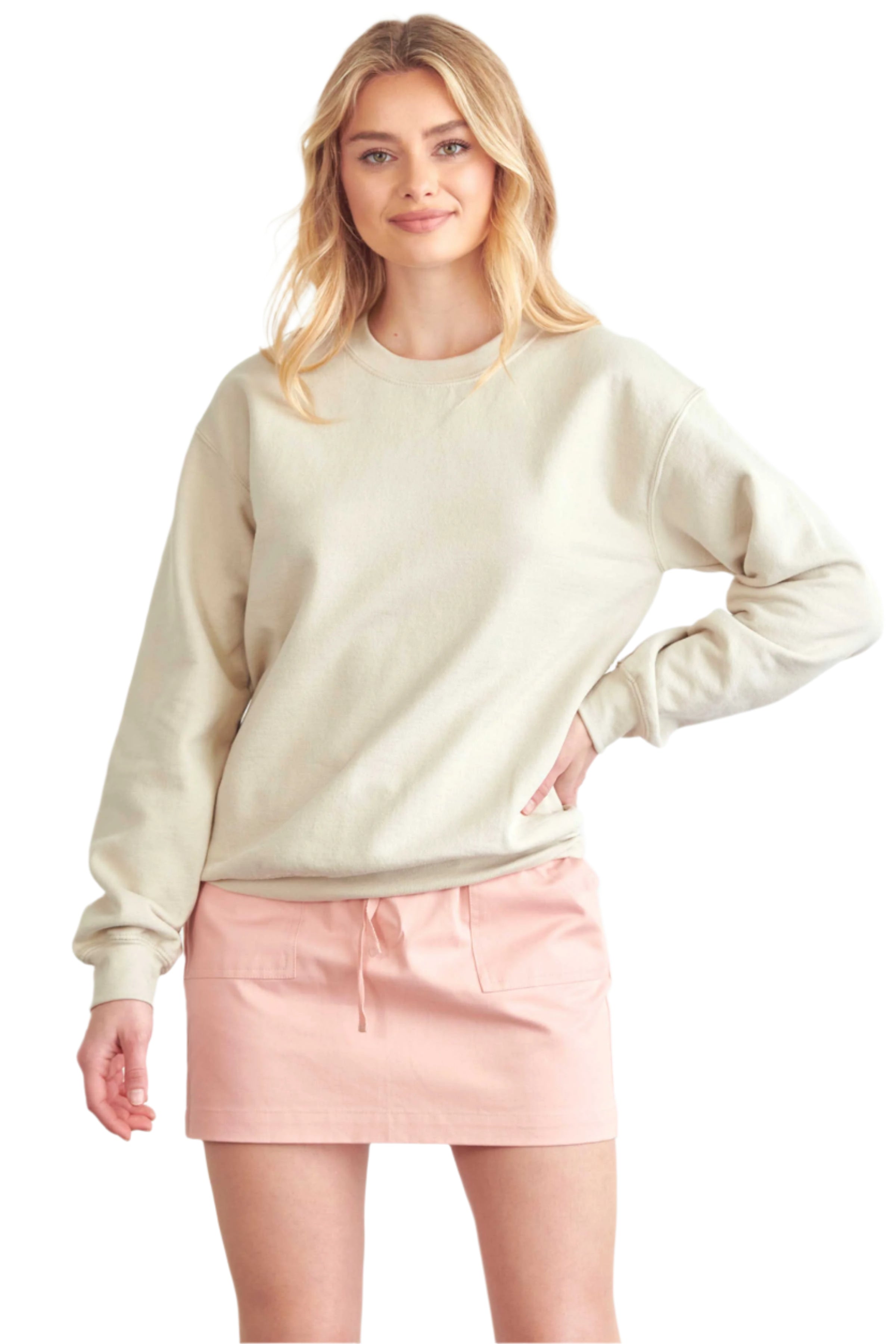 BLUME AND CO. women's drawstring skirt with pockets in light pink worn with a beige sweatshirt