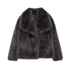 Stylish women's faux fur coat in dark gray with a plush collar for luxurious warmth