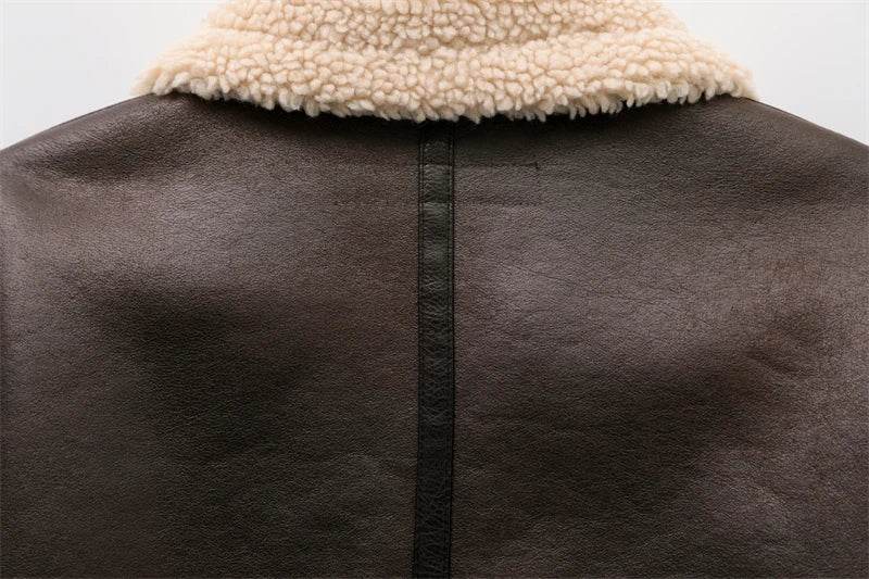 Women's faux shearling jacket in dark brown, cozy outerwear for chilly days.