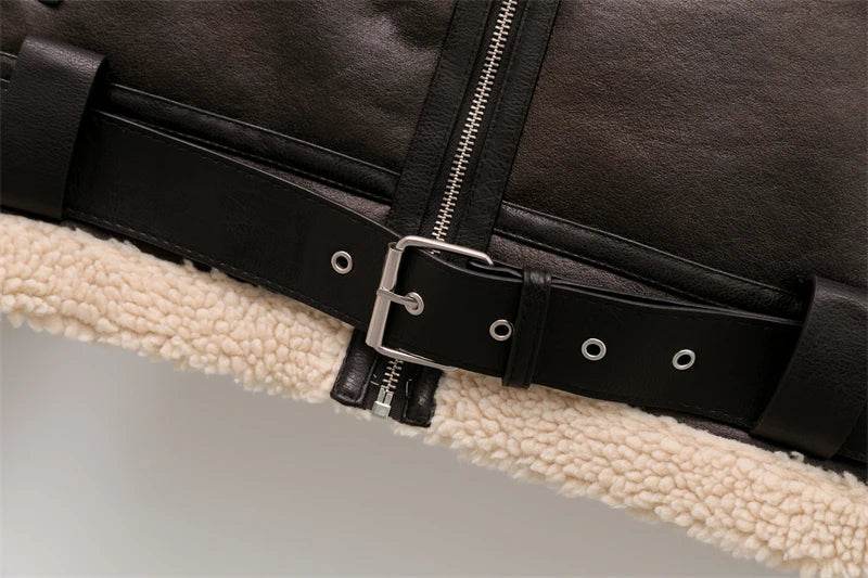 women's faux shearling jacket with black exterior and cream lining