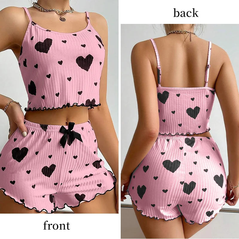 Women's heart print pajama set in pink, soft ribbed fabric for comfortable sleep
