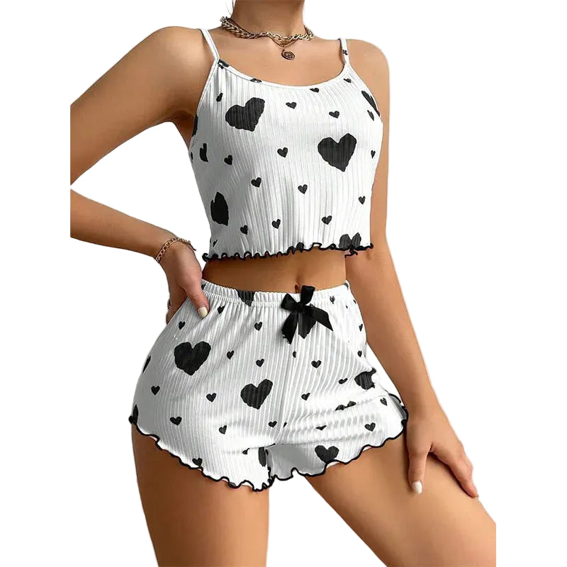 Women's heart print pajama set in white and black, cozy for lounging