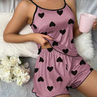 Women's heart print pajama set in pink, soft material for lounging