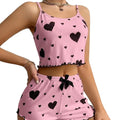Women's heart print pajama set in pink, perfect for sleep or lounging