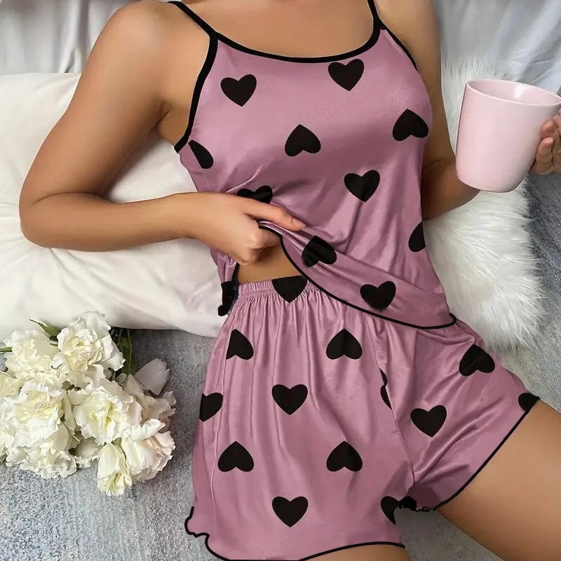 Women's heart print pajama set in pink, soft fabric for cozy nights