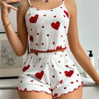 Women's heart print pajama set in white with red hearts, perfect for lounging