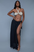 Women's swimwear with halter top and long black skirt, beach ready