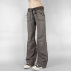 Gray women's jeans with a relaxed fit and adjustable drawstring