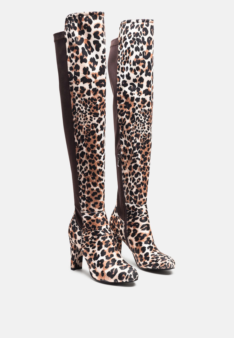 Stylish women's knee high block heel boots in leopard print, perfect for trendy outfits