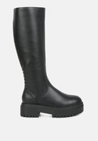 Stylish women's knee high boots in black with a chunky sole for a trendy look