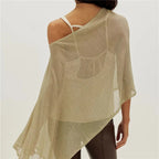 Women's poncho in beige, lightweight fabric for chic layering