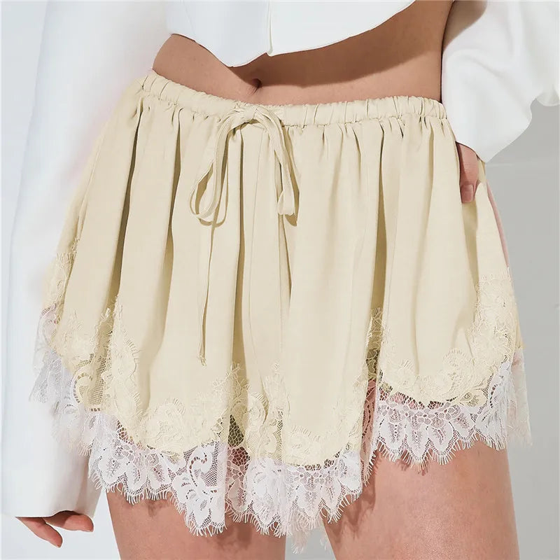 Women’s beige shorts with lace trim, perfect for summer outings