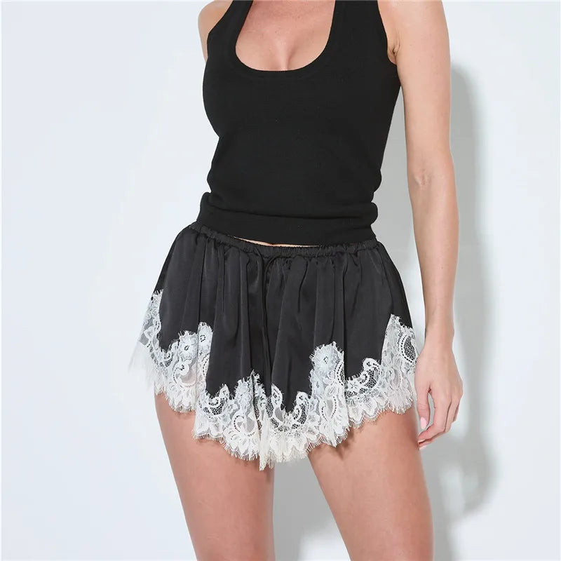 Women's black shorts with lace trim, perfect for summer outings