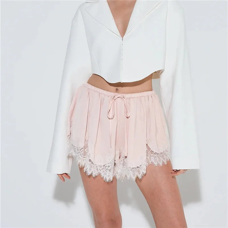 Women's pink lace trimming shorts, comfortable for casual and beach wear