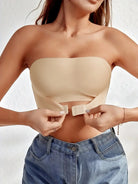 Women's strapless seamless bra in nude, perfect under summer outfits