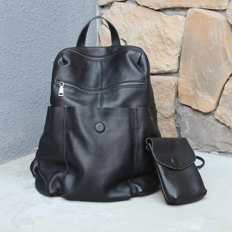 Womens stylish leather backpack in black for daily use with detachable pouch