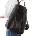 Womens stylish leather backpack in dark brown, ideal for daily use