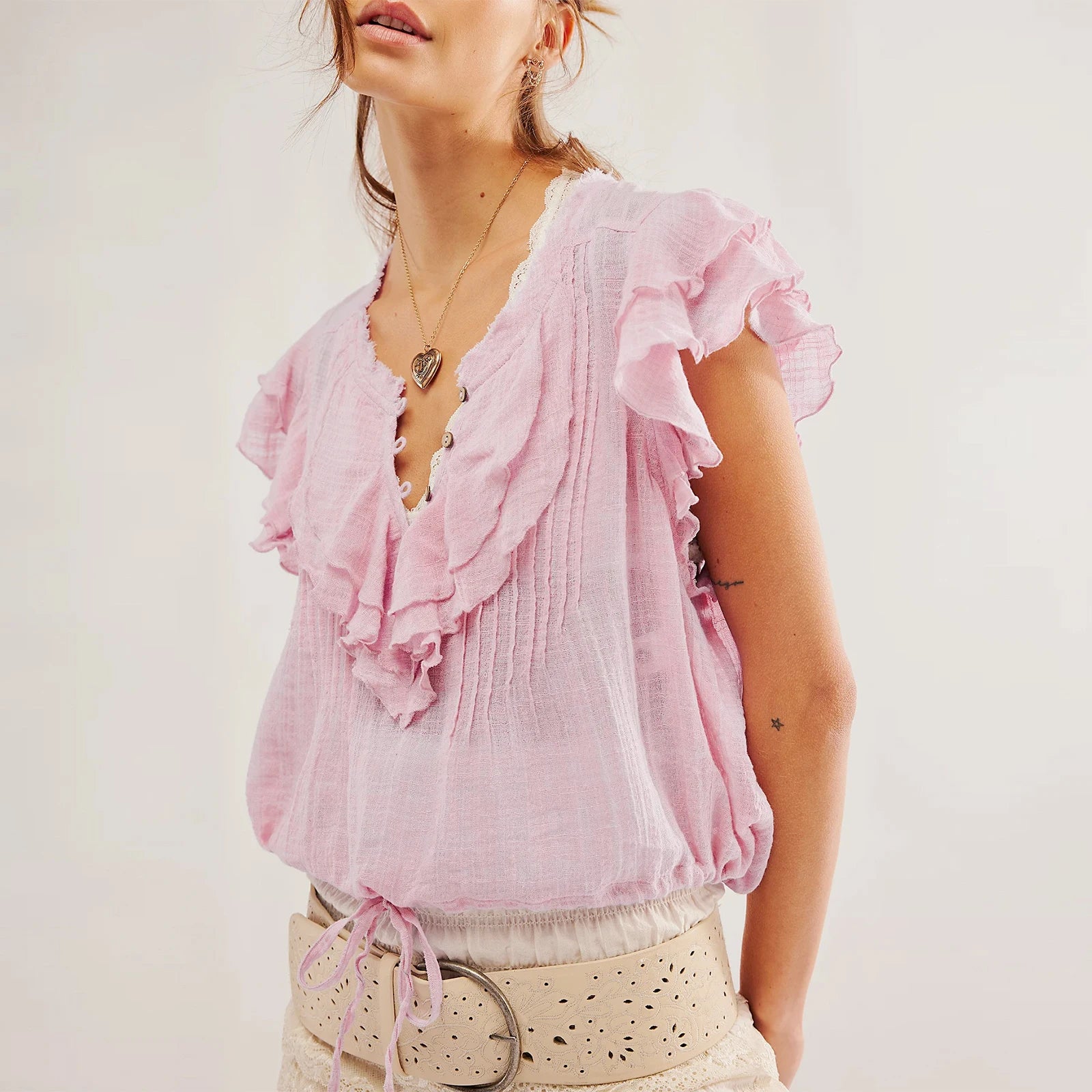 Women's pink ruffled linen blouse, perfect for summer outings